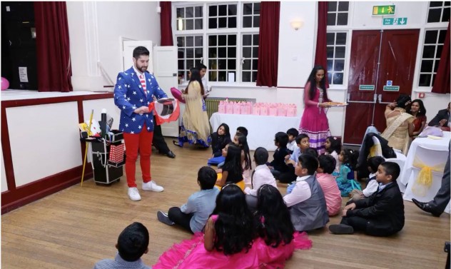 Magic Tony entertains children by performing loads of magic tricks.